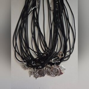 Chic Black and Silvertone Charm Necklace 25 Piece Collection
